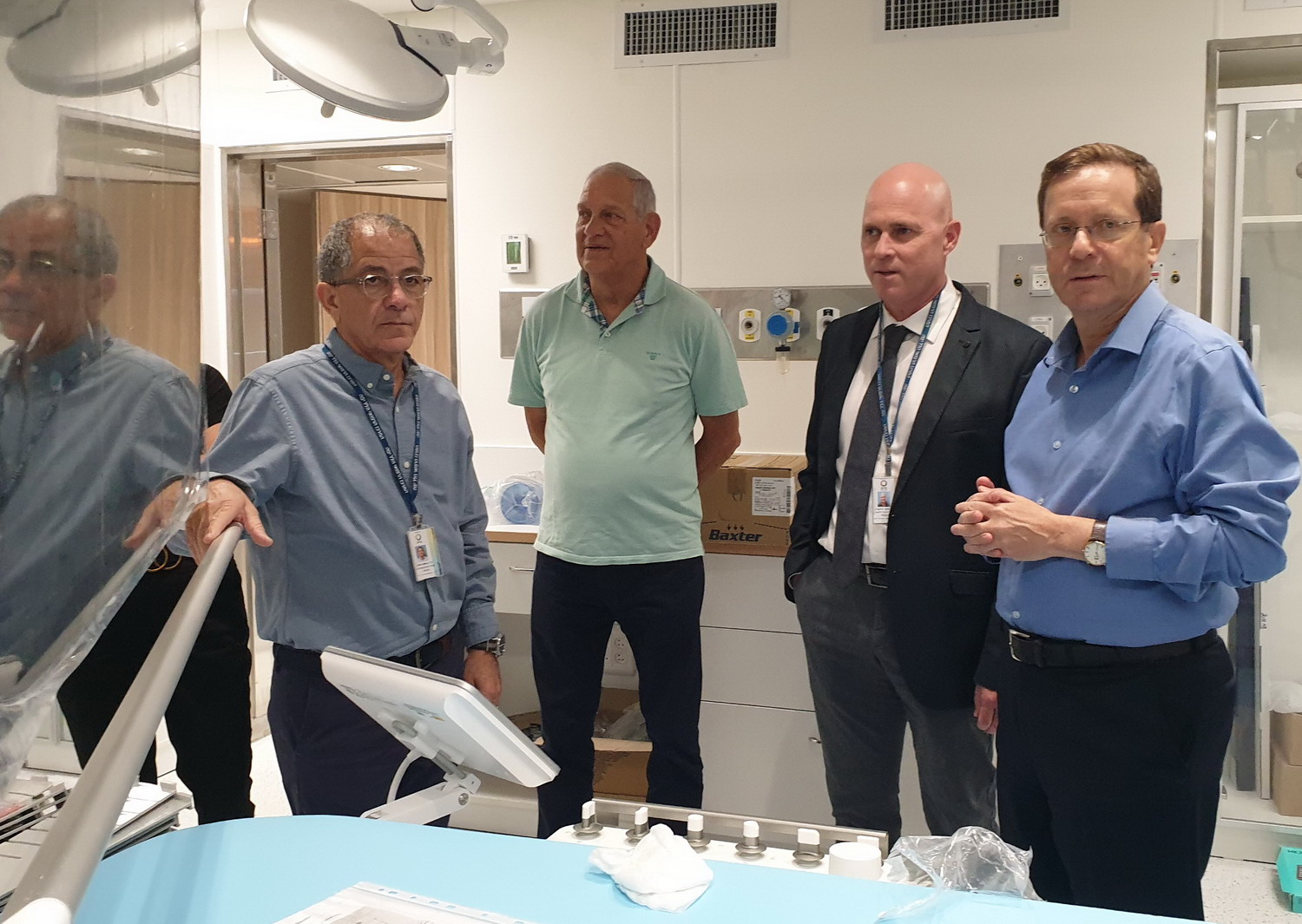 From right to left: Chairman of the Jewish Agency for Israel, Mr. Isaac (Bougie) Herzog; Director of the Hillel Yaffe Medical Center, Dr. Mickey Dudkiewicz; Chairman, Friends of Hillel Yaffe Medical Center, Mr. Moshe Morag, and the Administrative Director, Dr. Amnon Ben Moshe in the area of the new cardiac catheterization rooms